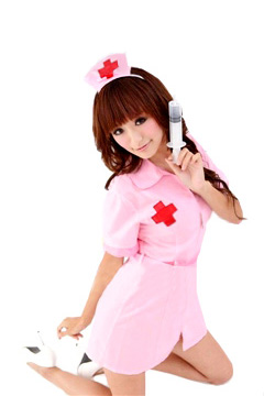 Nurse SuziQ with large plastic syringe